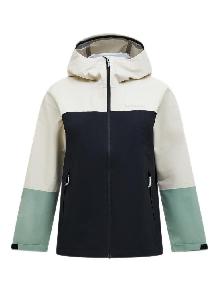 Eine Jacke im Farbblock-Design mit beigen, schwarzen und grünen Einsätzen und einem Frontreißverschluss.